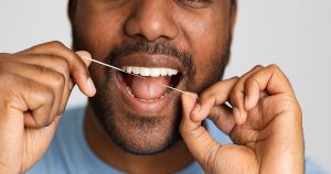 Importance of Flossing: Floss Like a Pro and Unlock Smile Power