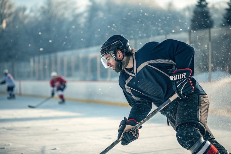a hockey player wearing custom sports mouthguards 