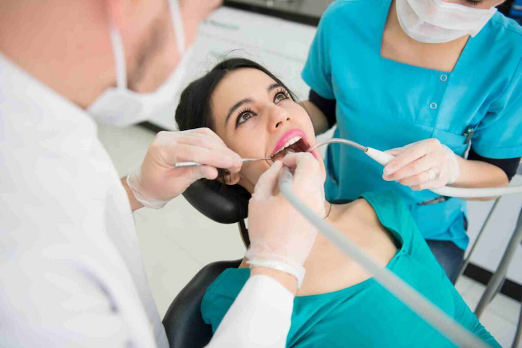 a photo of the process of dental bonding for craze line treatment